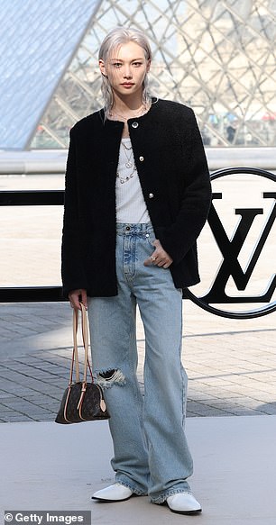 Felix sported a black blazer and light blue jeans