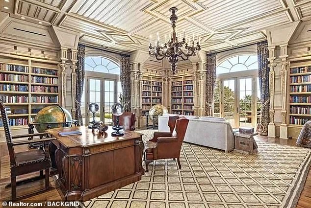 The three-level main house spanned 30,000 square feet with four bedrooms, a living room, library (above) and gourmet kitchen