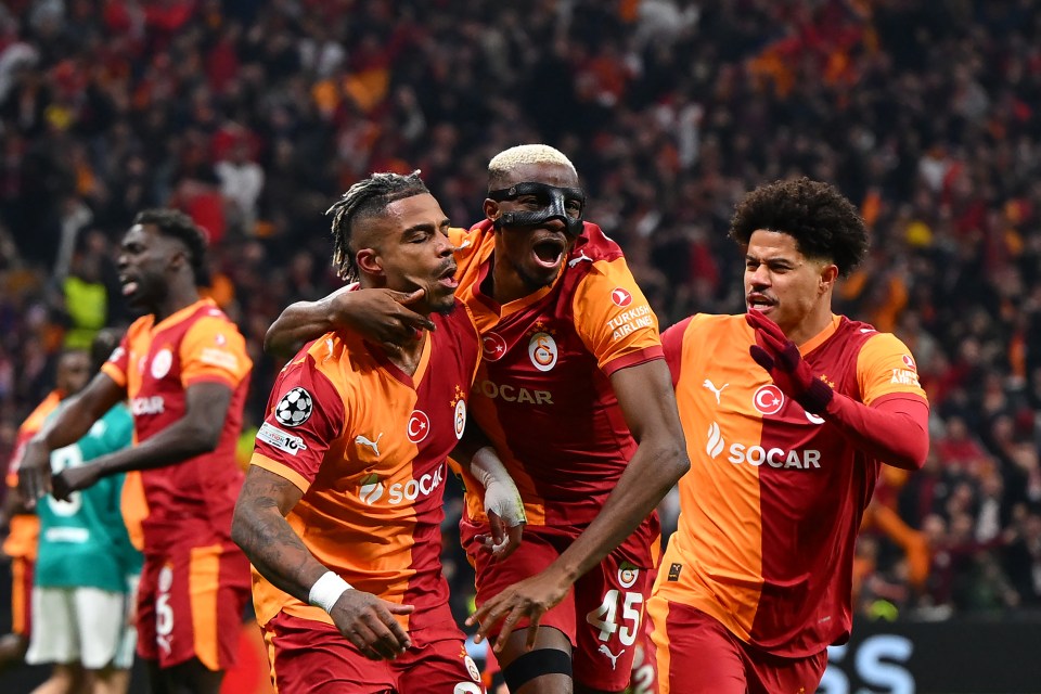 Mario Lemina, Victor Osimhen, and Gabriel Gomes Sara of Galatasaray celebrate a goal during a UEFA Champions League match.