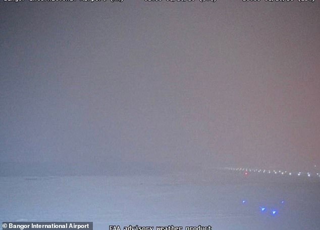 Weather cameras capture the poor visibility at the airport around the time of the crash
