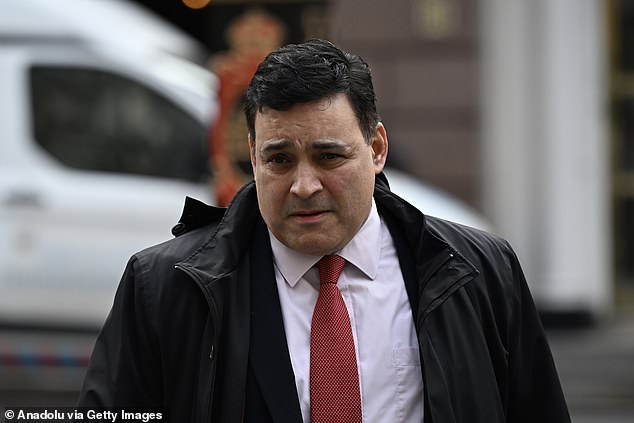 Jonathan Ganesh was injured in the IRA attack at London's Docklands in 1996. He is one of three men suing Mr Adams