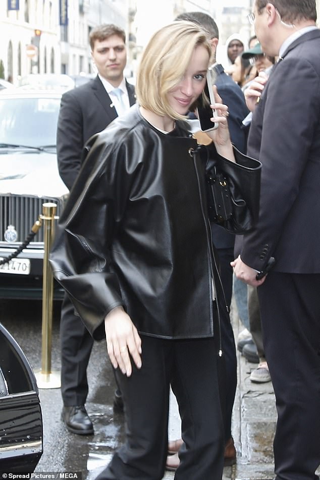 The Bridgerton actress, 30, showed off her perfect sense of style in a black leather jacket as she arrived at her hotel after the star-studded Louis Vuitton show