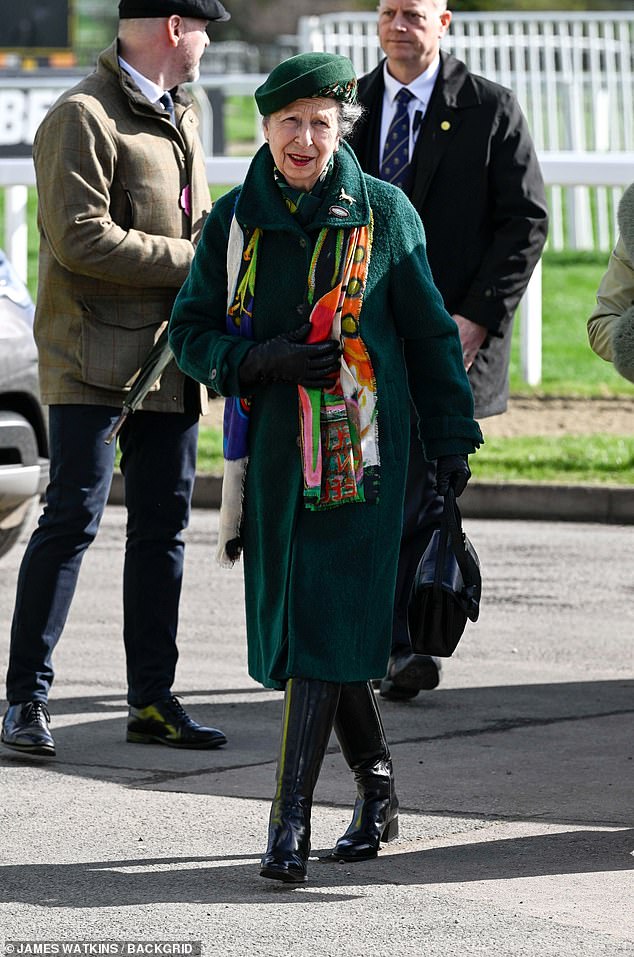 Not long after, the Princess Royal was seen making her way to the course in a forest green ensemble that she paired with a brightly coloured silk scarf