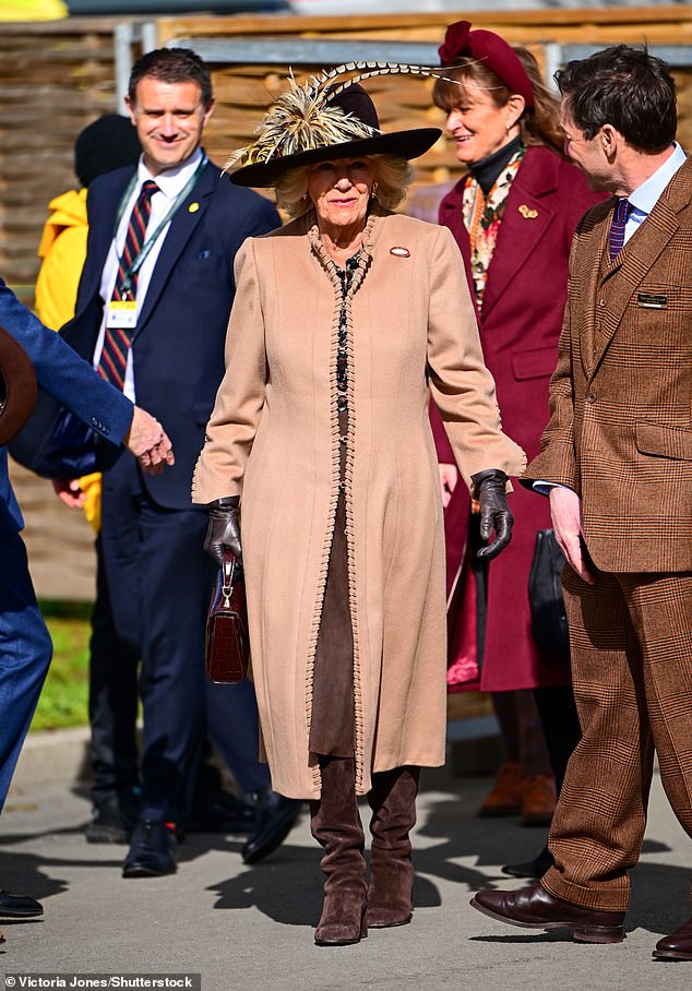 The Queen arrived for Ladies Day wearing a camel coat with a brown suede skirt and matching boots as Camilla, 78, finished the look with a flamboyant feather hat