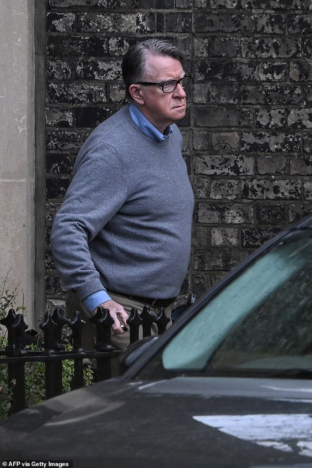 Lord Mandelson outside his London home this morning ahead of the documents being released