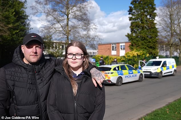 Leon Brister, 35, with his daughter Letizia Brister, 16, who said the school bell started ringing at about 10.20 and did not stop