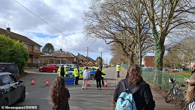 Around 100 parents arrived at the school grounds after hearing the reports on social media, pleading with police for more information
