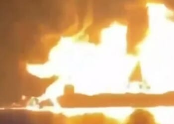 Moment huge explosions tear through oil tankers after Iran's bomb boats hit ships as crews scramble to escape inferno
