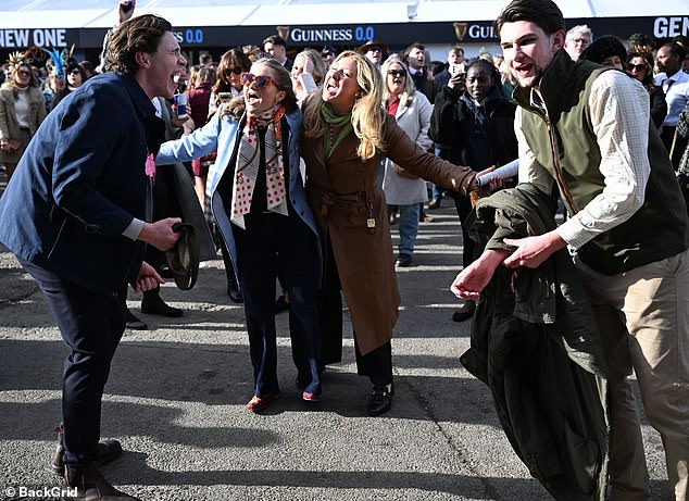 Serenading the ladies: Racegoers get into the party spirit as 57,242 turned up to enjoy the second day at Cheltenham