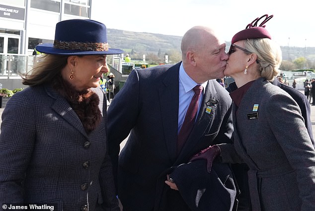 Zara and Mike Tindall put on a very loved-up display as they arrived at the Gloucestershire racecourse on Wednesday - even as Carole crashed their date