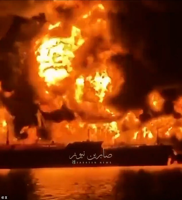 This is the moment Iraqi oil tankers erupt into flames after being struck by explosive-filled Iranian boats