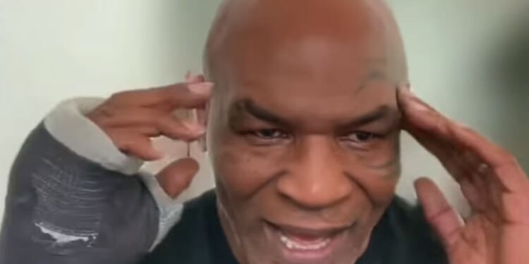 'We'll see' - Mike Tyson spotted in cast and plunges Floyd Mayweather mega-fight into doubt with cryptic injury update