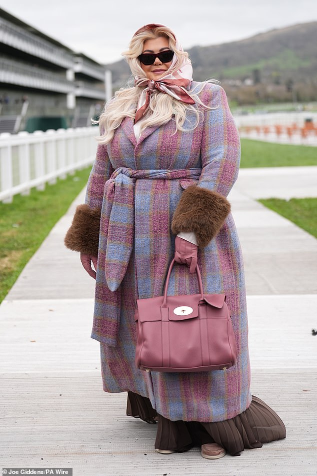 Gemma went for all out glamour in a checked coat with a Mulberry bag and fur cuffs