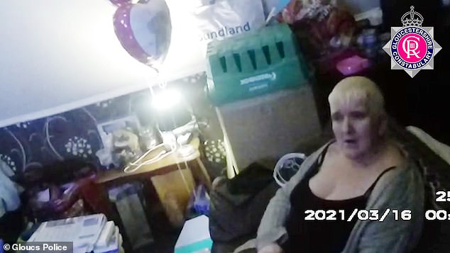 Amanda Wixon in a video taken by police at the time of her arrest at her home in 2021
