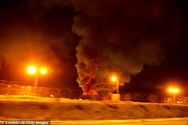 Fire breaks out following explosion where a military base is located, in Erbil, Iraq, yesterday