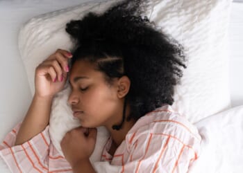 Eight tips to help you secure a good night's sleep from fluffy socks to lying on the floor