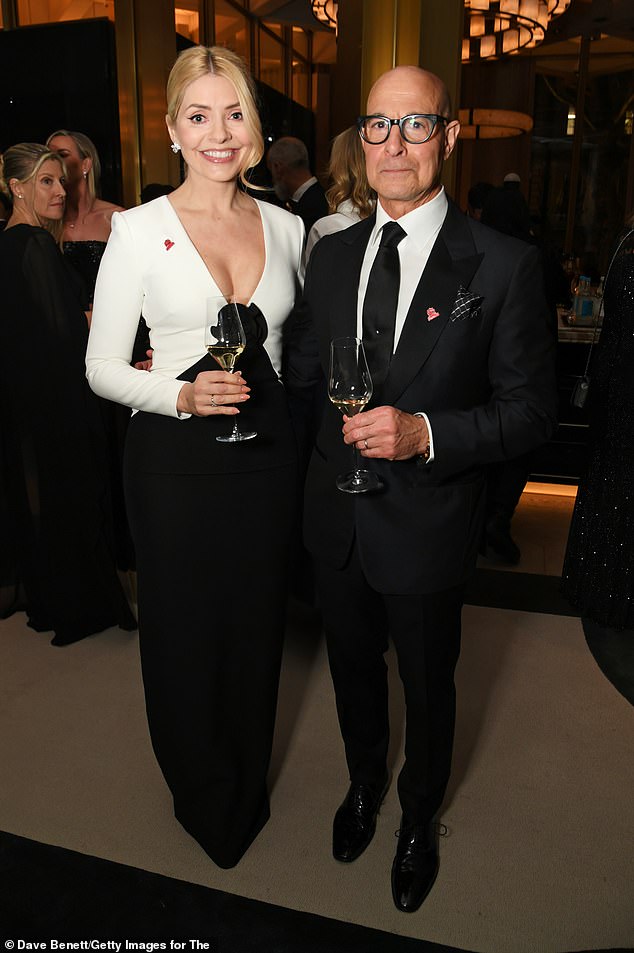 Holly posed for a snap with Stanley Tucci
