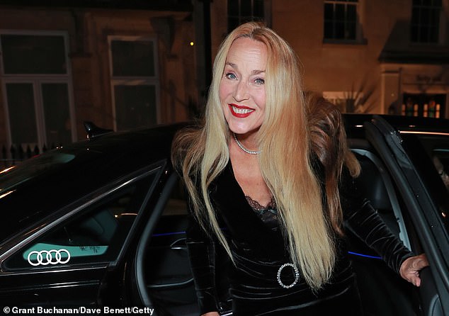 Jerry looked in great spirits as she beamed while climbing out her car