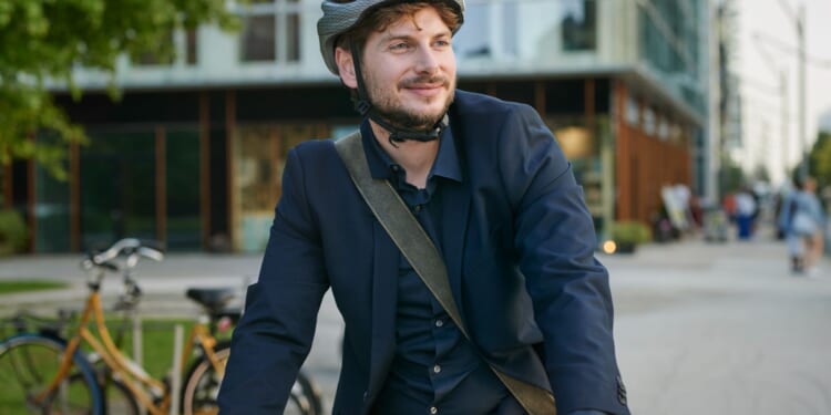 Half of cyclists do NOT wear helmets as they are 'uncool' or mess up hair, poll reveals