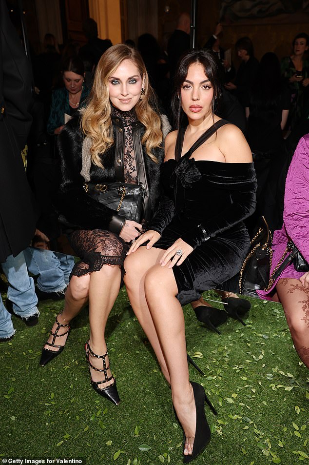 Georgina was seen sitting front row with Chiara Ferragni, who looked incredible in a black lace dress