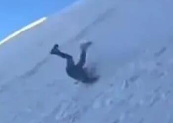 Terrifying moment mountaineer slips and uncontrollably hurtles down snowy mountain as onlookers scream in terror
