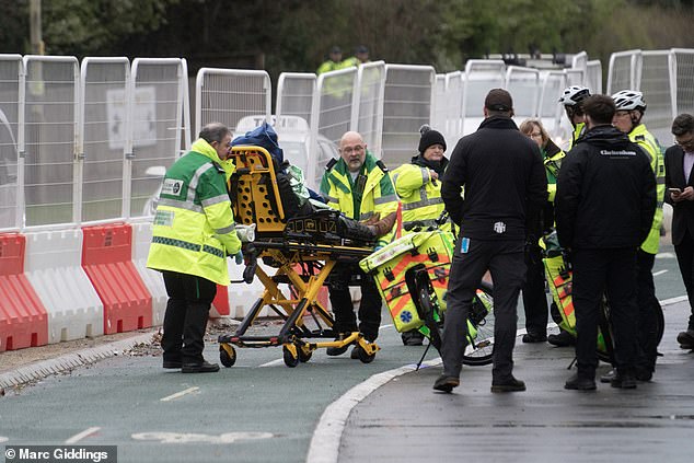 Another man was seen leaving the festival in a gurney as gales battered the racing event