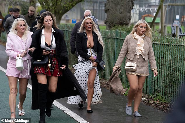 Many were dressed to the nines as they made attended the third day of the festival despite the rain and wind