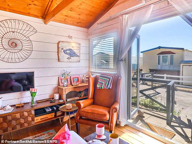 The luxury wooden holiday home is 17ft long and almost 15ft wide, with most of the accommodation in one multi-purpose room, apart from a separate shower room