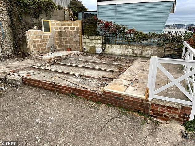 The couple spent three months and £53,000 demolishing the old building and having a new chalet built off-site then transported to the beach