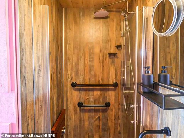 The bathroom has a shower, sink and toilet and had been designed to accommodate for Mr Williams's needs