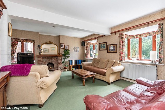 The main house, front car park and back garden are on separate land registry but within the same plot. Inside there is a living room with a working fireplace and a kitchen with a breakfast area that has access straight through to the tearooms