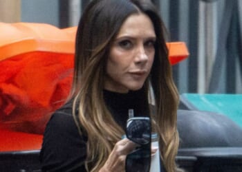 Victoria Beckham stuns in thigh-split dress after it's revealed daughter Harper's make-up line will rival Kylie Jenner's
