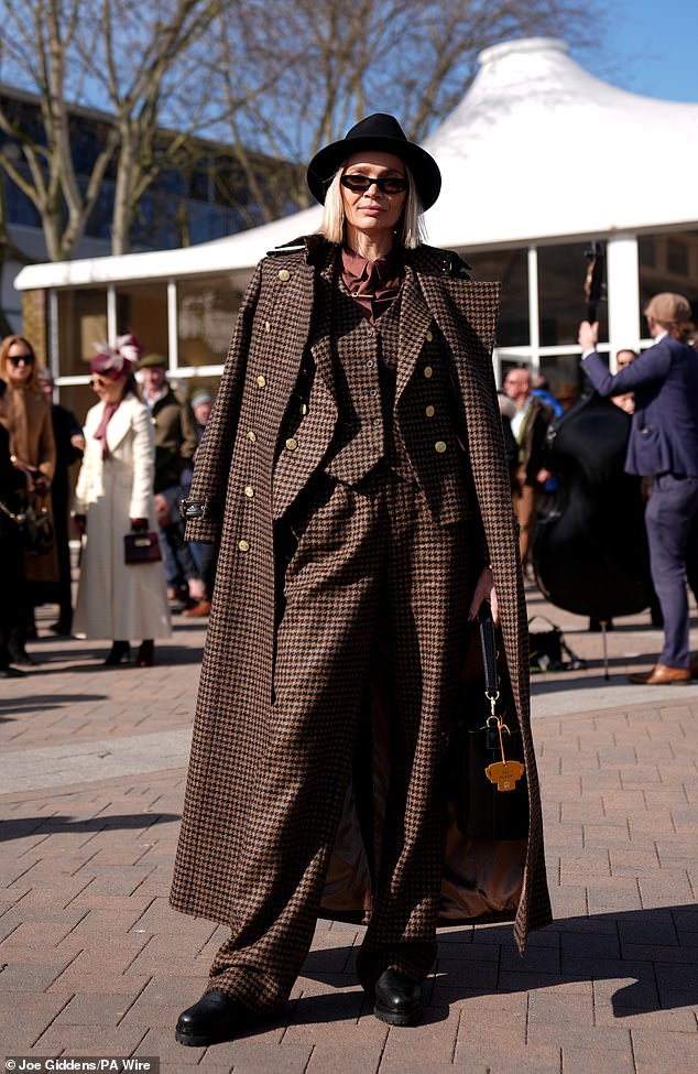 Jodie Kidd opted for a houndstooth  suit with a matching coat and black shoes