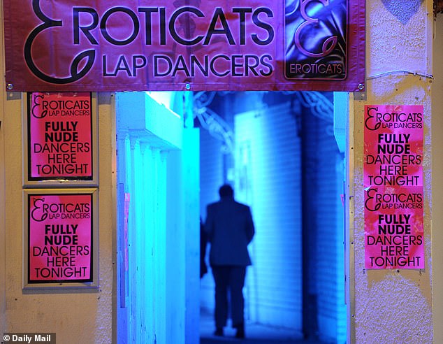 Under The Prom, a bar in the basement of one of the buildings in the parade, has been transformed this week into Eroticats lap-dancing club