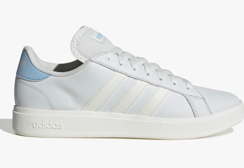 White Adidas trainers with light blue accents.