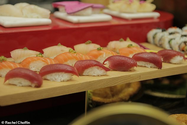An array of nigiri made of salmon, ahi tuna, and will be served to the stars