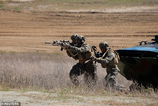 United States Marine's take part in an amphibious assault demonstration as part of their 250th anniversary celebration attended by U.S. Vice President JD Vance, at Camp Pendleton, California, U.S. October 18