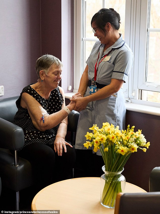 A nurse treats a patient at the hospital in London, where Kate had chemotherapy