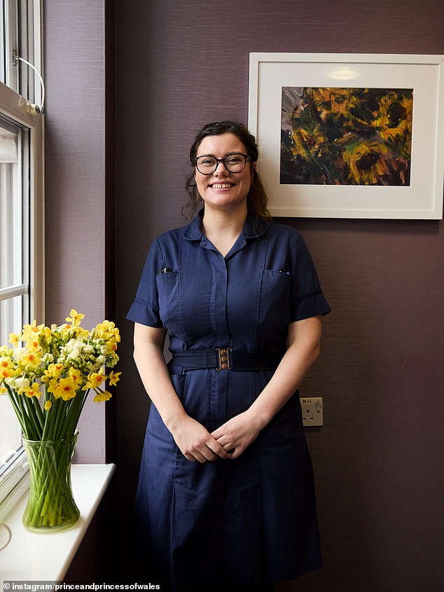 A nurse at The Royal Marsden poses with the flowers Kate touchingly sent