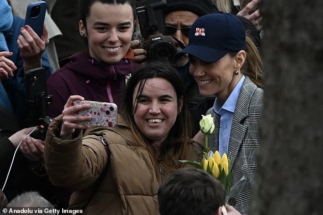 Kate stops for selfies with royal fans at the RNLI Tower Lifeboat Station in London on Thursday