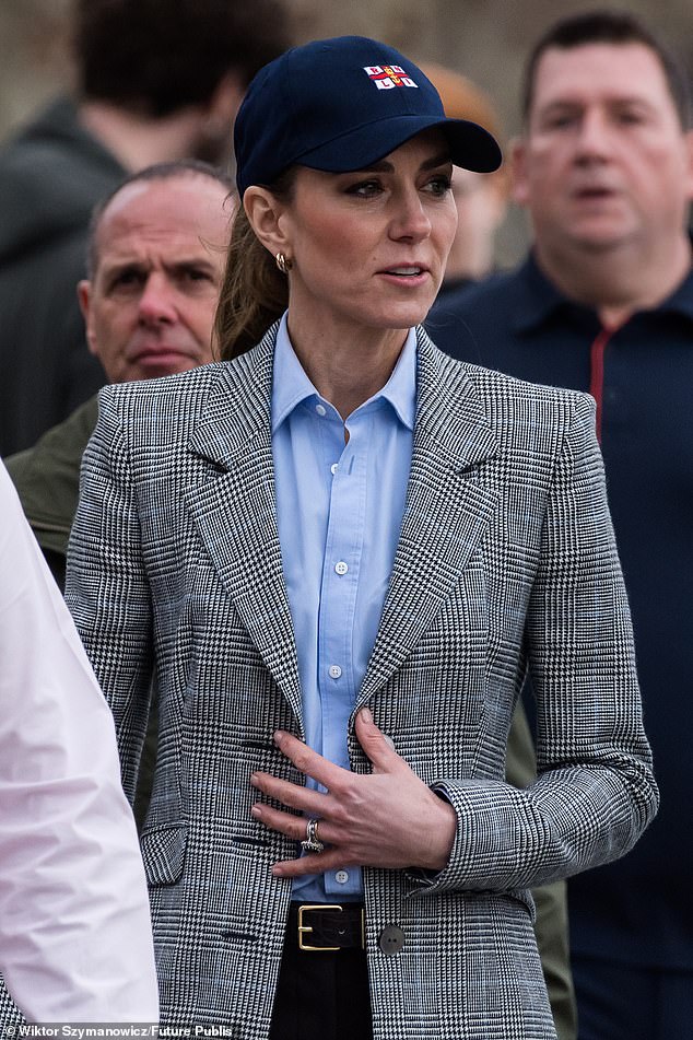 The Princess wore a £95 blue shirt from British womenswear brand With Nothing Underneath – along with a Catherine Walker blazer, chocolate brown cigarette trousers and new pair of suede ankle boots by Jimmy Choo
