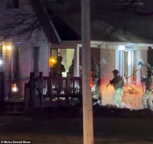 Federal authorities were seen late Thursday night raiding the $315,600 home in Dearborn Heights where the Lebanese-born restaurant worker is believed to have lived