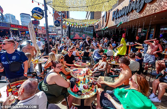 Brits enjoy booze in the sun as they enjoy the final day of the races. While a pint of Guinness will set you back £7.50 at Cheltenham, Benidorm offers £1.70 a pint