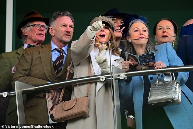 Christian and Geri, who are proud owners of horse Life Me Up, looked to be enjoying themselves as they watched the races from a balcony