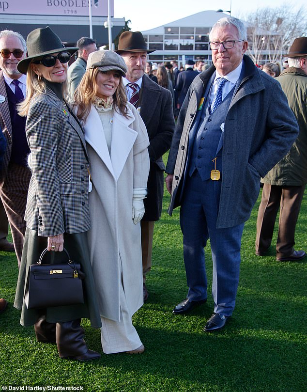 Christian, 52, donned a dapper three-piece tweed green suit