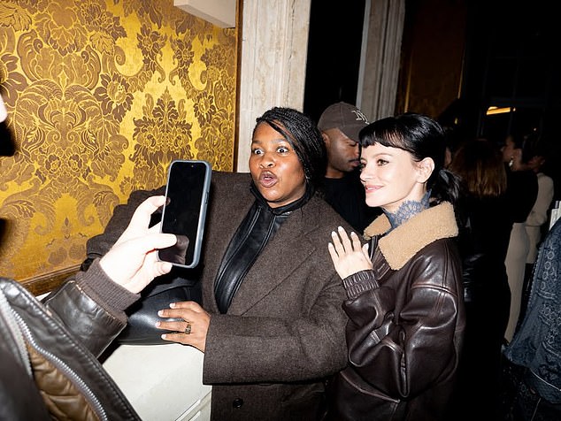 Lily looked in great spirits as she posed for snaps