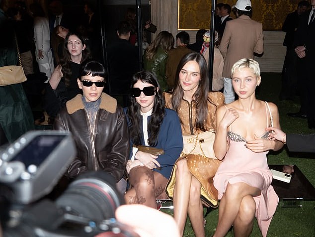 She was also seen sitting front row at the show