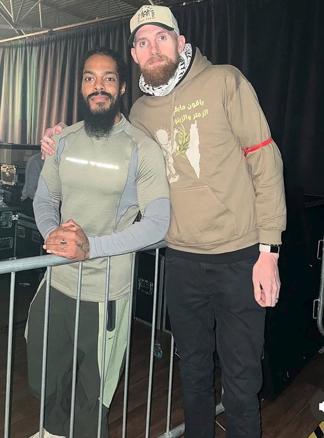 Pictured: Mr Bourne, right, with punk rap duo Bob Vylan's frontman, Bob Vylan, who became infamous for his 'death to the IDF' chants at Glastonbury last year