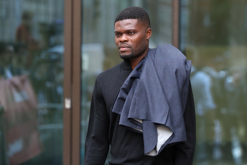 Thomas Partey, an Arsenal football player, walks outside Westminster Magistrates' Court in London.