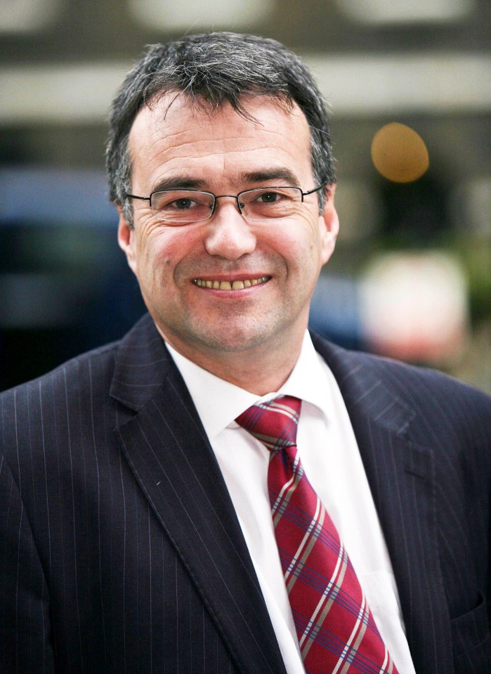 Phil Woolas MP smiles and punches the air after retaining his seat in the 2010 General Election.
